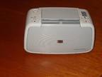 PHOTOPRINTER,  HP Photosmart A310 series printer,  has...